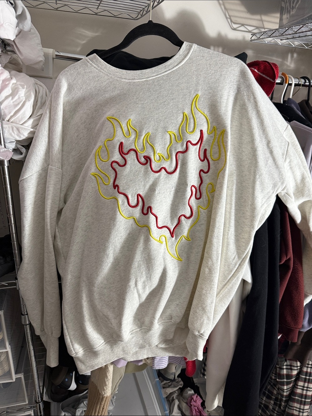The Laundry Room light gray crewneck with flame embroidered detail